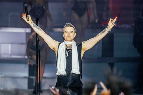 From Angels to Let Me Entertain You: The Magic of Robbie Williams' Anthems